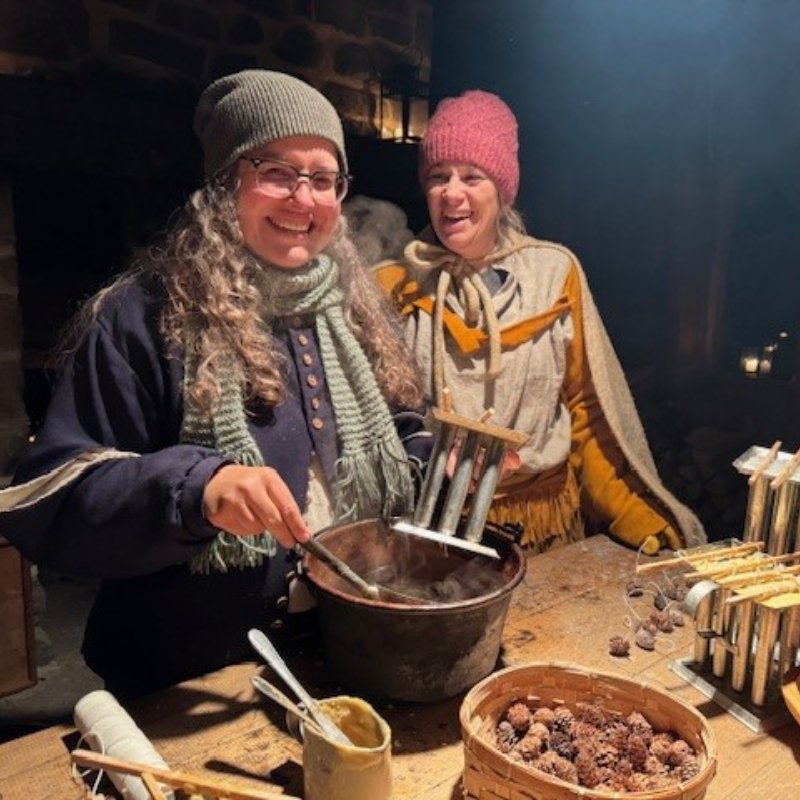 Saint Marie among the hurons. Candle making demonstation. two girls 